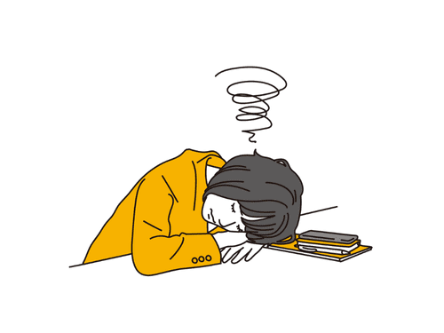 疲労や睡眠不足から仕事中に昼寝をする女性