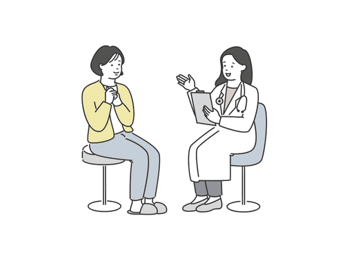 病院で診察してもらっている女性のイラスト