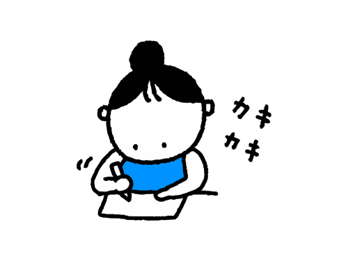 メモを取るお団子頭の女性