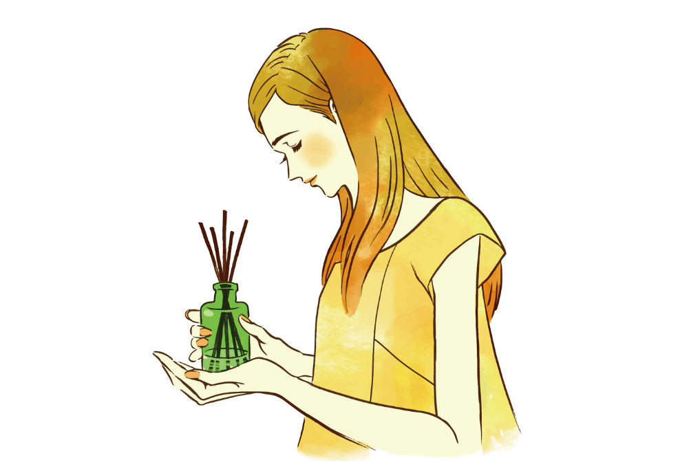 香水を持つ女性のイラスト